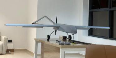 Fixed-wing UAV prototype on the workbench at the StrixEye workshop